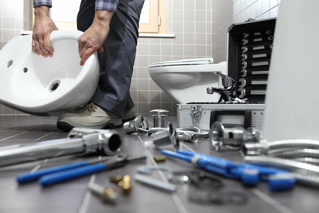 Plumbing tools prepared for a bathroom repair in Denver