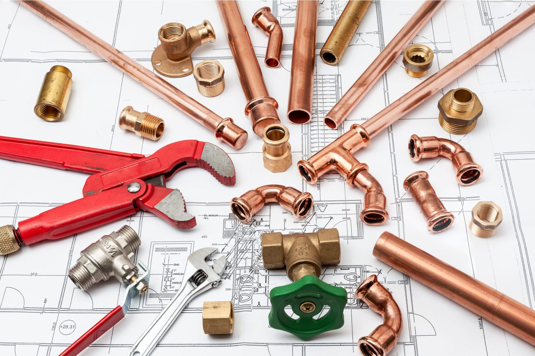Copper pipes, fittings, valves, and plumbing tools in Denver